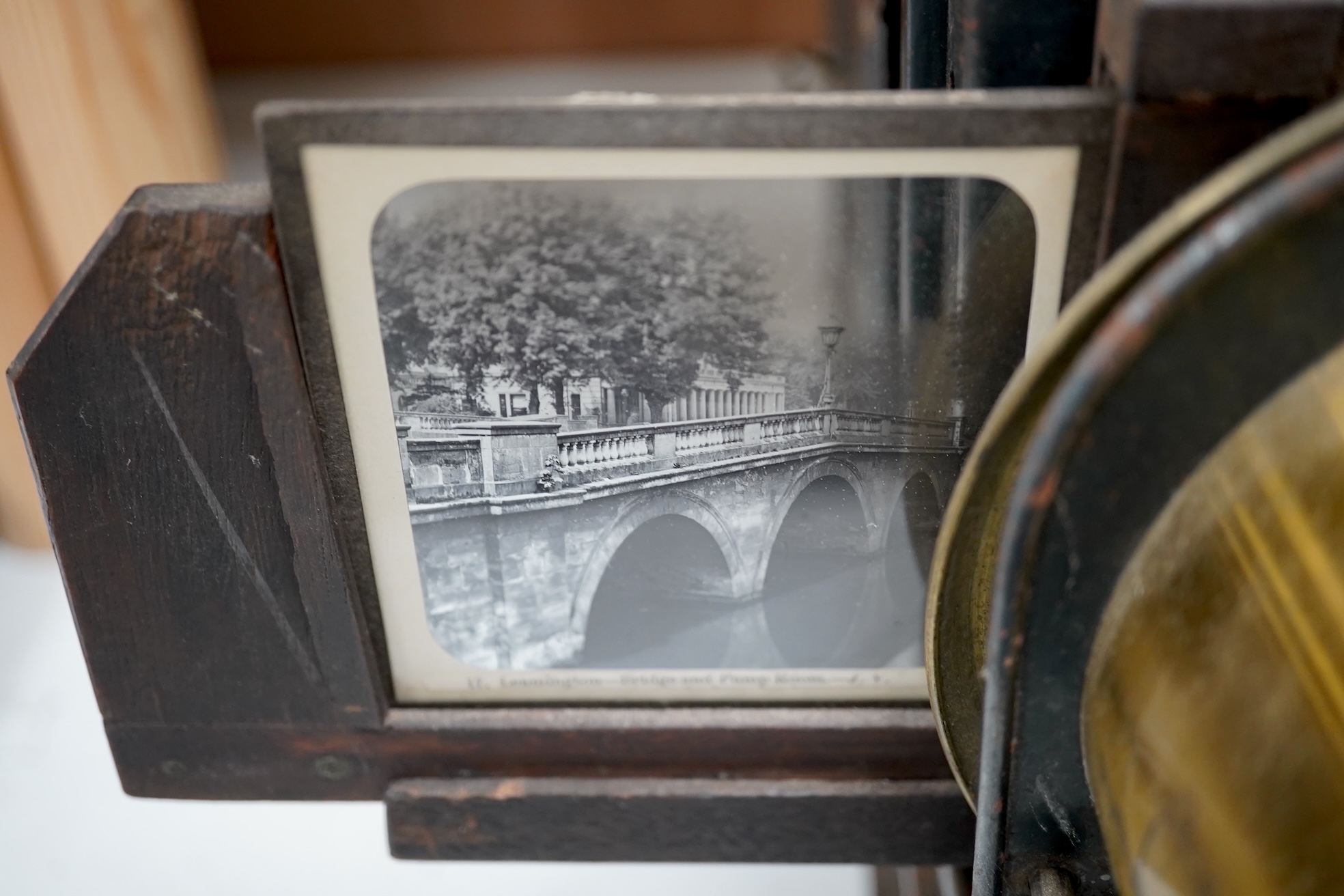 A 19th century magic lantern slide projector, 43cm deep. Condition - black metal rusty